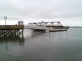 Aluminum gangway from shore to dolphin.