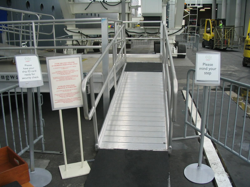 The right hand turn shortened the distance the gangway extended from the ship. A longer ramp would have interfered with dockside activities.