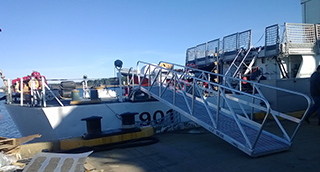 Located at the First District Coast Guard Station. The Escabana, Superior Docks brow, and landing platform.