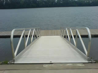 Extra-wide aluminum gangway make loading and unloading small craft easy