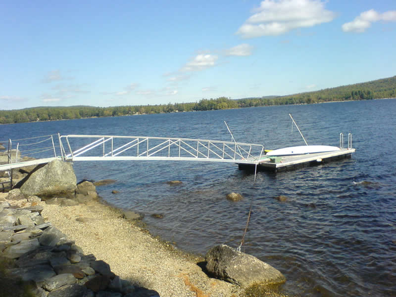 This 30' x 3' gangway and 8' x 16' float with boat whips and a swim ladder are located on Green Lake in Ellsworth, ME.