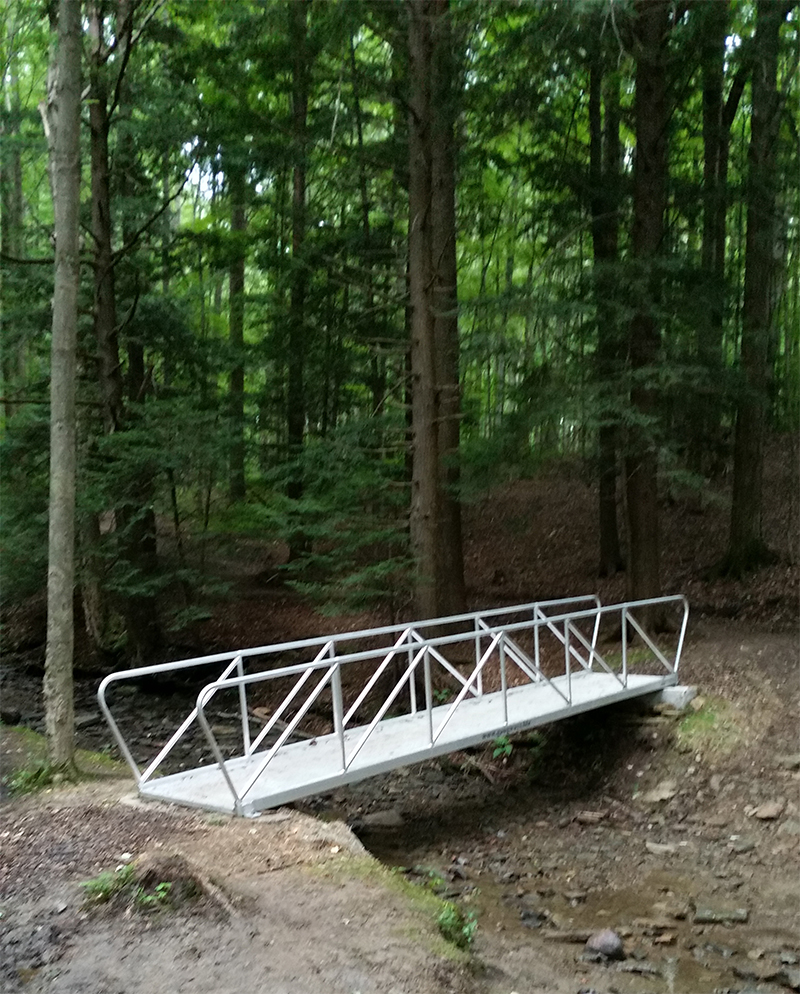 aluminum gangways go between a set of dolphins